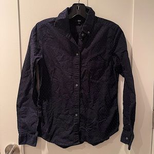 Navy blue with small white polka dots button down shirt from Uniqlo.